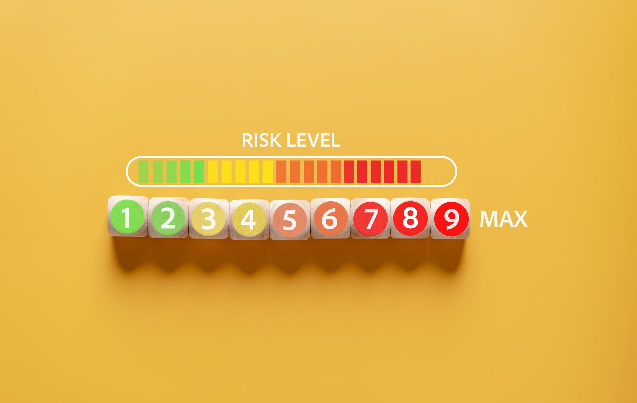 decision making and risk analysis. Measuring level bar on wooden cube block
