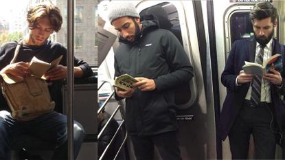 Two men reading books on a train.