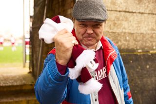 Shaun Dooley as Alan's football manager dad Graham Carr.