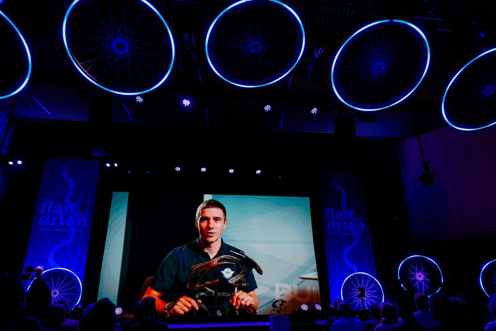 Belgian Soudal Quick-Step team's Belgian rider Remco Evenepoel is seen on the screen during the "Flandrien" award ceremony for the best Belgian cyclist of the 2024 cycling season, organised by newspaper "Het Nieuwsblad", in Middelkerke, on November 5, 2024. (Photo by DAVID PINTENS / Belga / AFP) / Belgium OUT