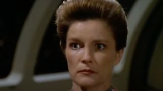 Janeway reacting to seeing her father who is actually an evil alien