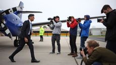 Britain's Prime Minister and Conservative Party leader Rishi Sunak disembarks from his plane at Inverness Airport