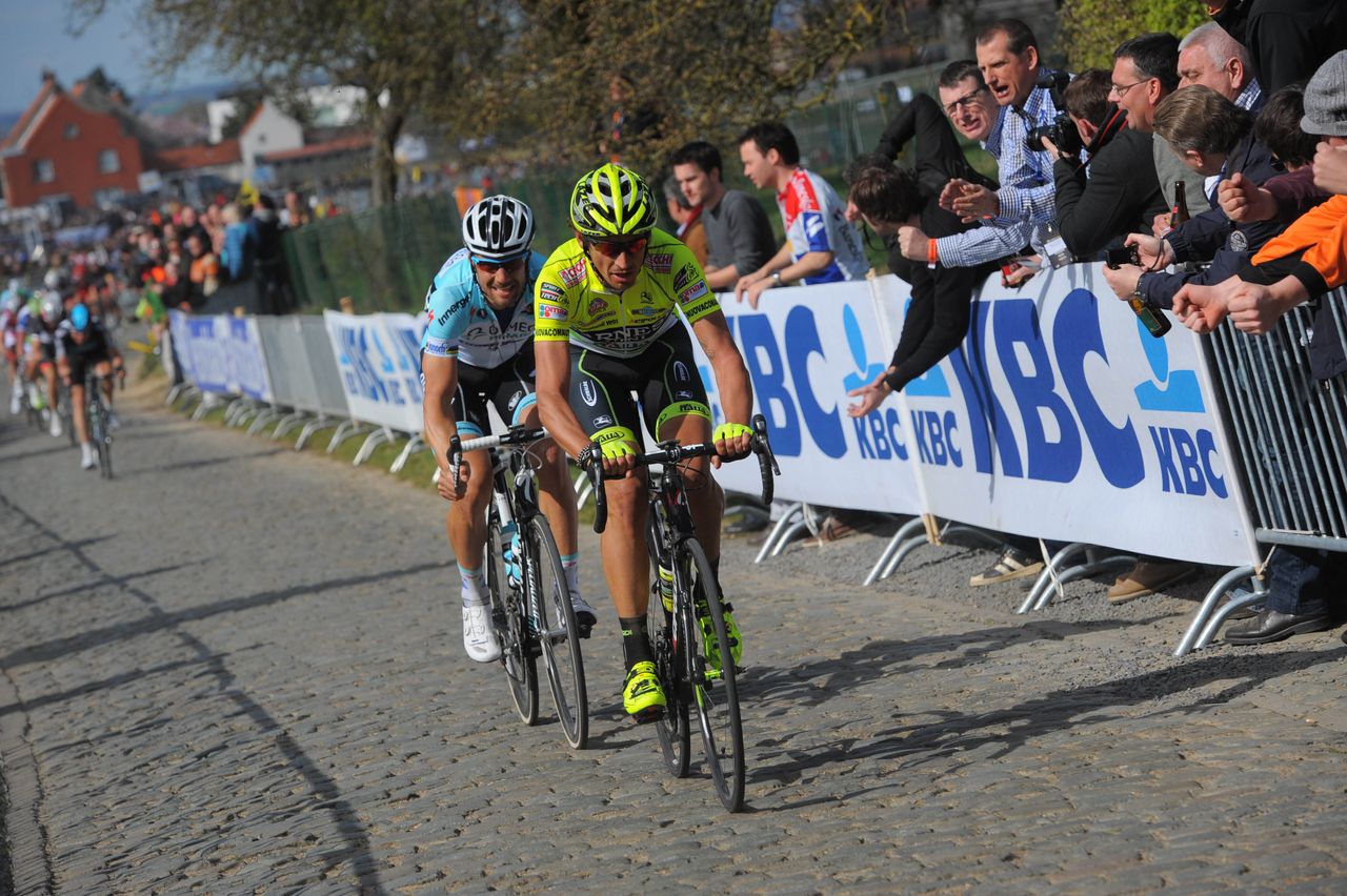Filippo Pozzato piles on the pressure at the 2012 Tour of Flanders. Tom Boonen follows.