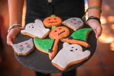 Selection of Halloween biscuits shaped like ghosts, pumpkins and witches hats