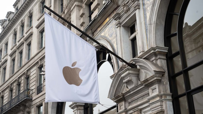 The Apple logo on a white flag at the brand&#039;s Regent Street store, representing Apple in the UK.