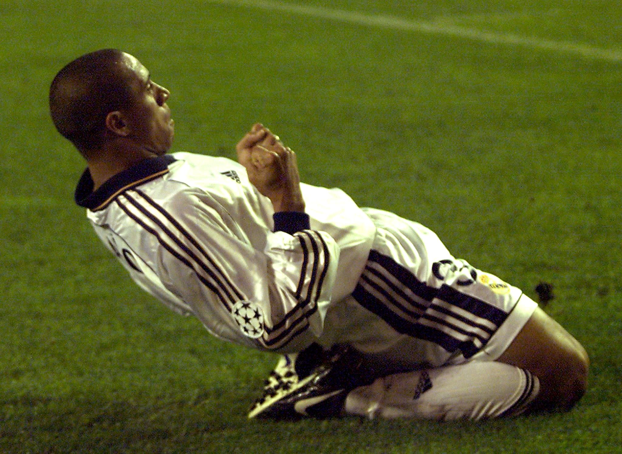 Roberto Carlos celebrates a goal for Real Madrid against Olympiacos in 1999.