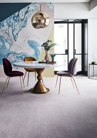 Marble effect wallpaper in a modern dining room