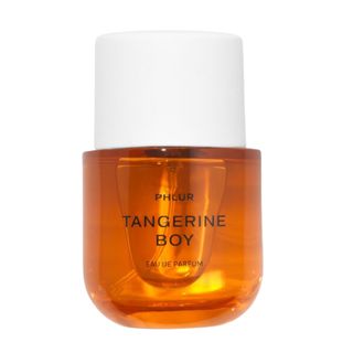 A press shot of the orange glass bottle of Phlur Tangerine Boy EDP