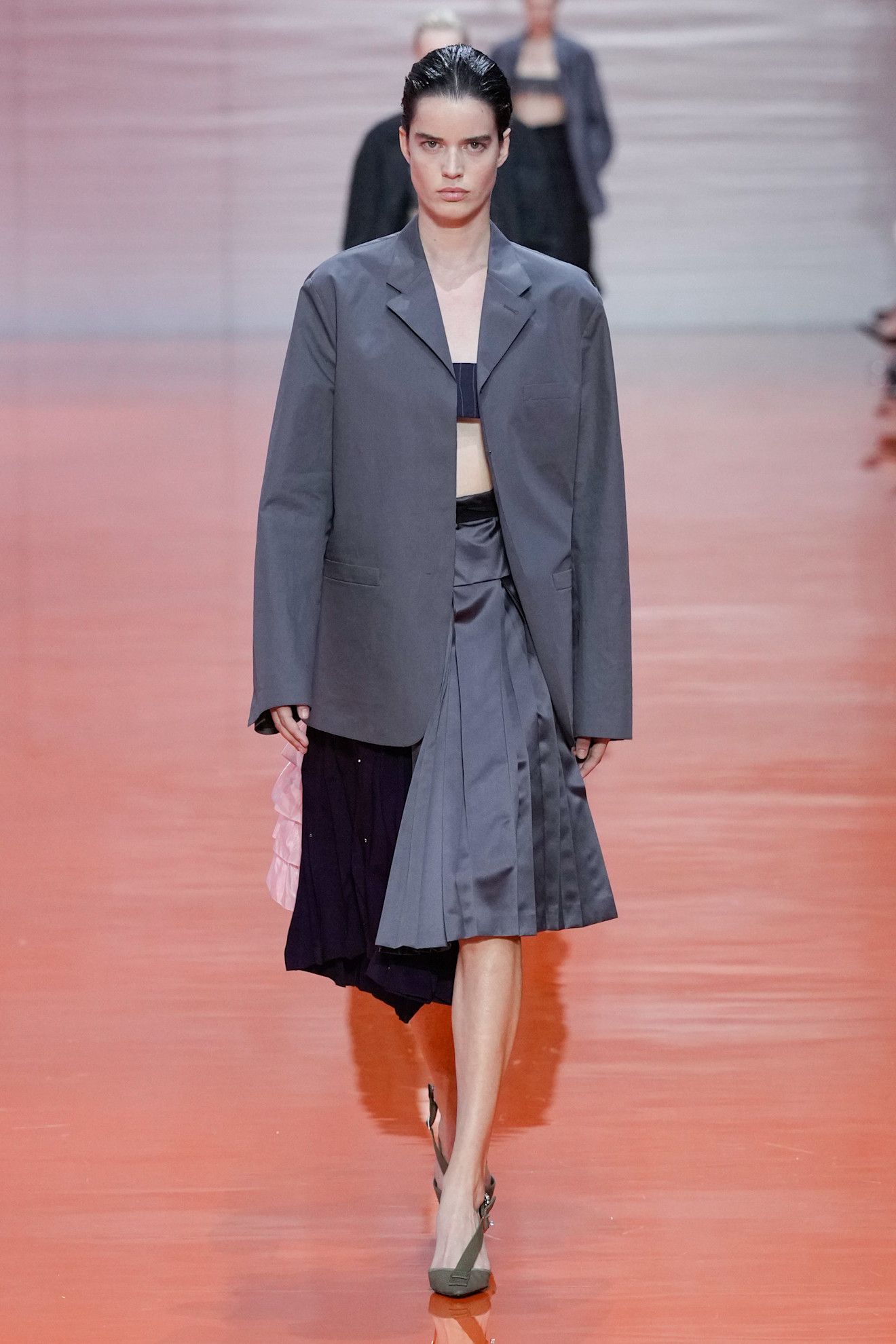 A Prada model wearing a Frankenstein skirt in the S/S 26 show.