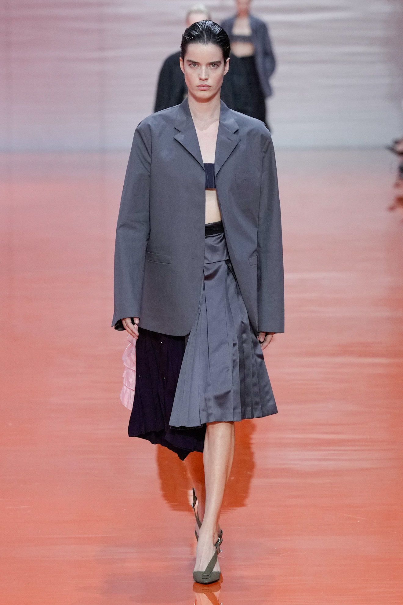 A Prada model wearing a Frankenstein skirt in the S/S 26 show.