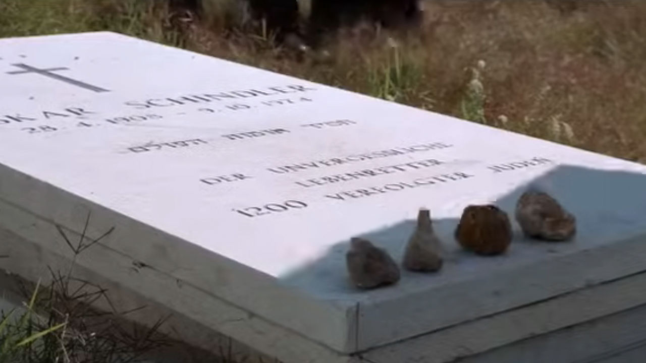 4 rocks on the grave of Oskar Schindler at the end of Schindler's List