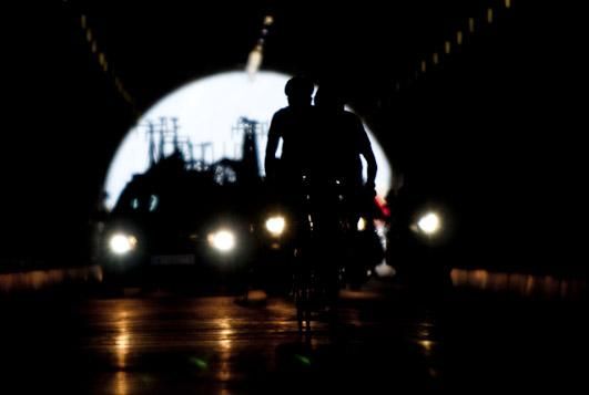 Riders negotiate a tunnel during the Tour of Austria.