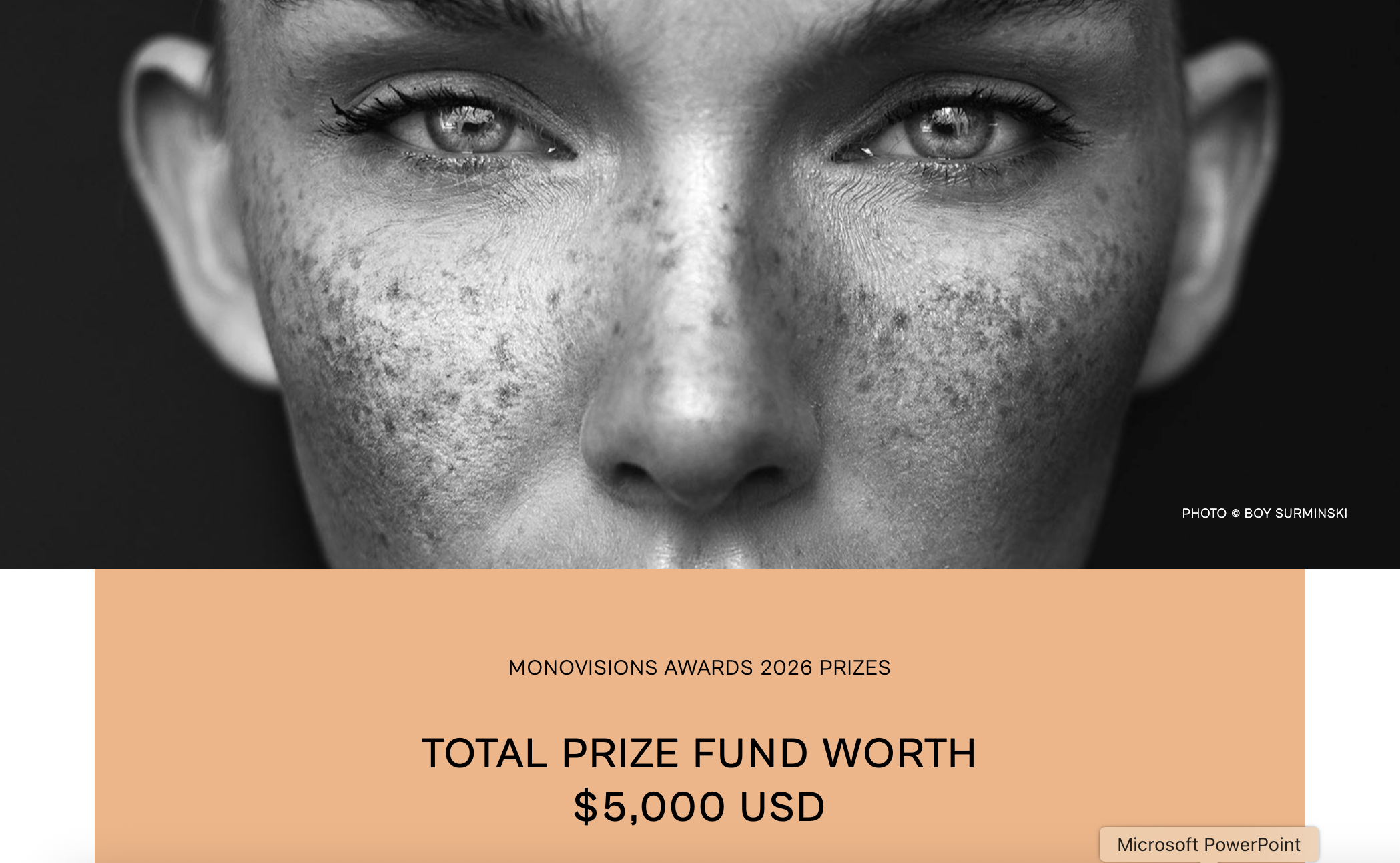A banner for the Monovisions Awards 2026, featuring a close-up, black-and-white portrait of a woman's freckled face and eyes, with an orange bar below displaying &amp;quot;TOTAL PRIZE FUND WORTH $5,000 USD.&amp;quot;