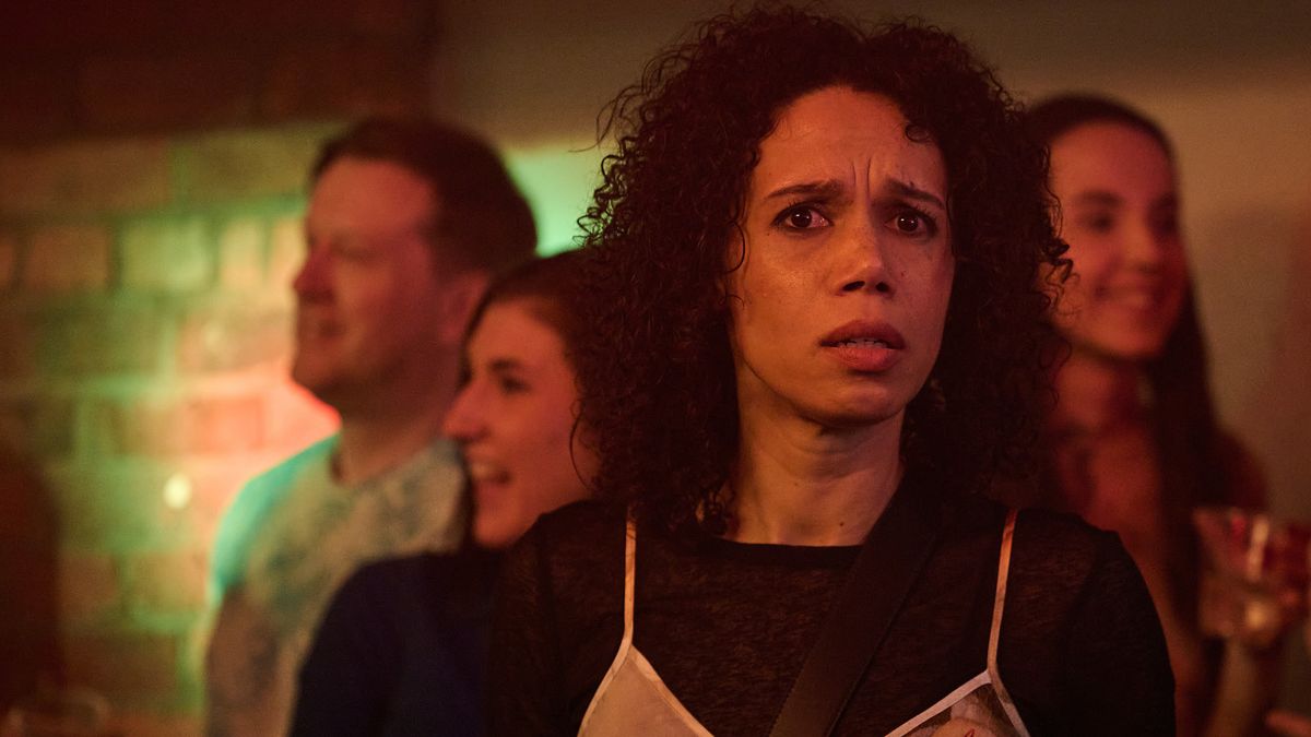 Carly (Vinette Robinson) in a club in Boiling Point episode 4