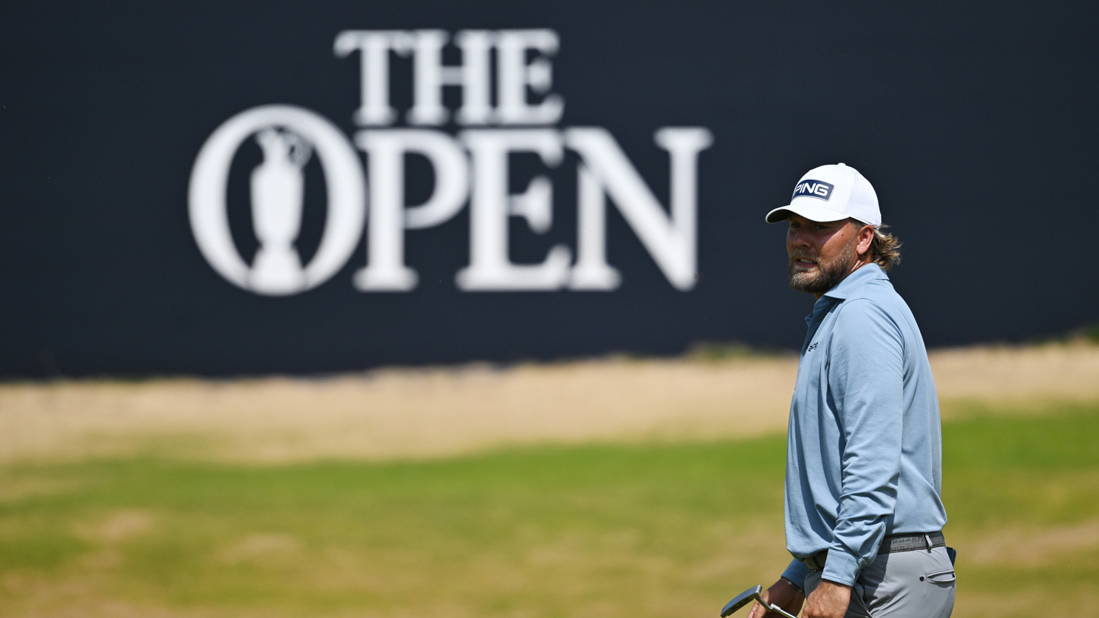 Dan Brown reacts to a missed putt at The Open