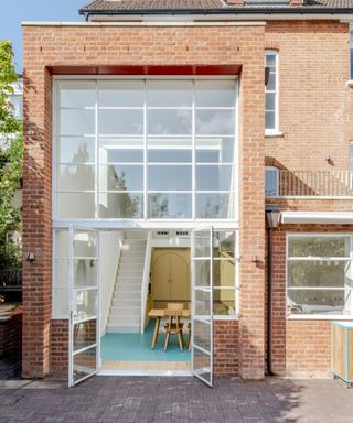 exterior shot of brick extension with white crittal style glazing