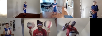 The kids show off their basketball moves with two Harlem Globetrotters.