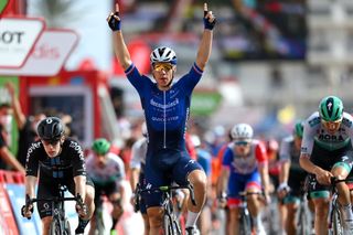 LA MANGA SPAIN AUGUST 21 Fabio Jakobsen of Netherlands and Team Deceuninck QuickStep celebrates winning ahead of Alberto Dainese of Italy and Team DSM during the 76th Tour of Spain 2021 Stage 8 a 1737 km stage from Santa Pola to La Manga del Mar Menor lavuelta LaVuelta21 on August 21 2021 in La Manga Spain Photo by Stuart FranklinGetty Images