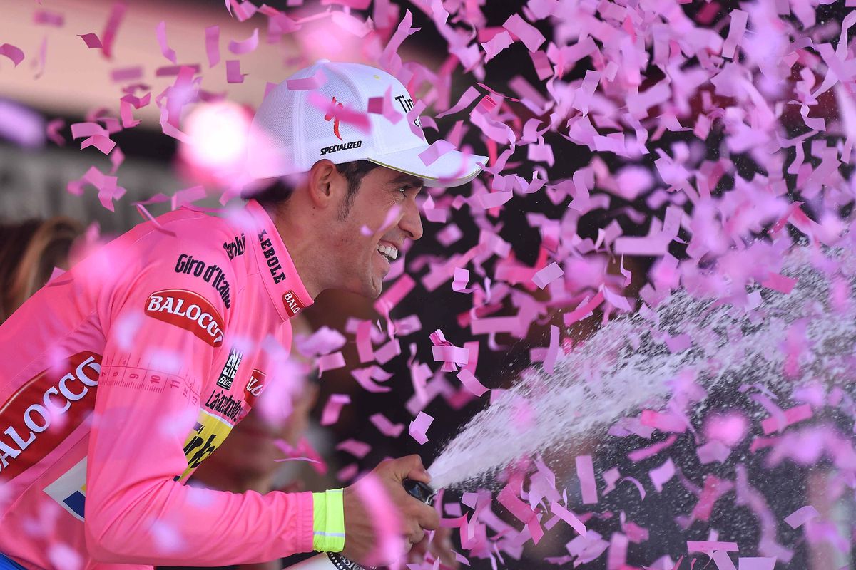 Alberto Contador enjoys his stage 17 time on the podium