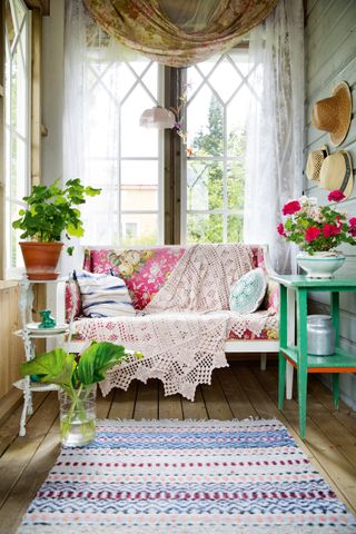 Swedish house porch with vintage and plants