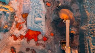 Aerial photo of an industrial conveyor belt moving slag at steel mill in Scunthorpe in England.