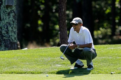 President Barack Obama golfing