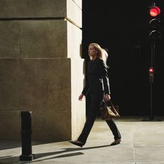 blonde model walking through the street