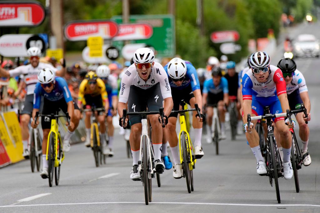 WOODSIDE AUSTRALIA JANUARY 28 Blake Quick of Australia and Team Inform Tmx Make crosses the finishing line to stage win ahead of Jensen Plowright of Australia and Team Westpac and Cameron Scott of Australia and Team Ara Pro Racing Sunshine Coas during the 2nd Santos Festival Of Cycling 2022 Mens Elite Stage 2 a 1129km stage from Mount Lofty to Onkaparinga Valley Road Woodside TourDownUnder on January 28 2022 in Woodside Australia Photo by Daniel KaliszGetty Images
