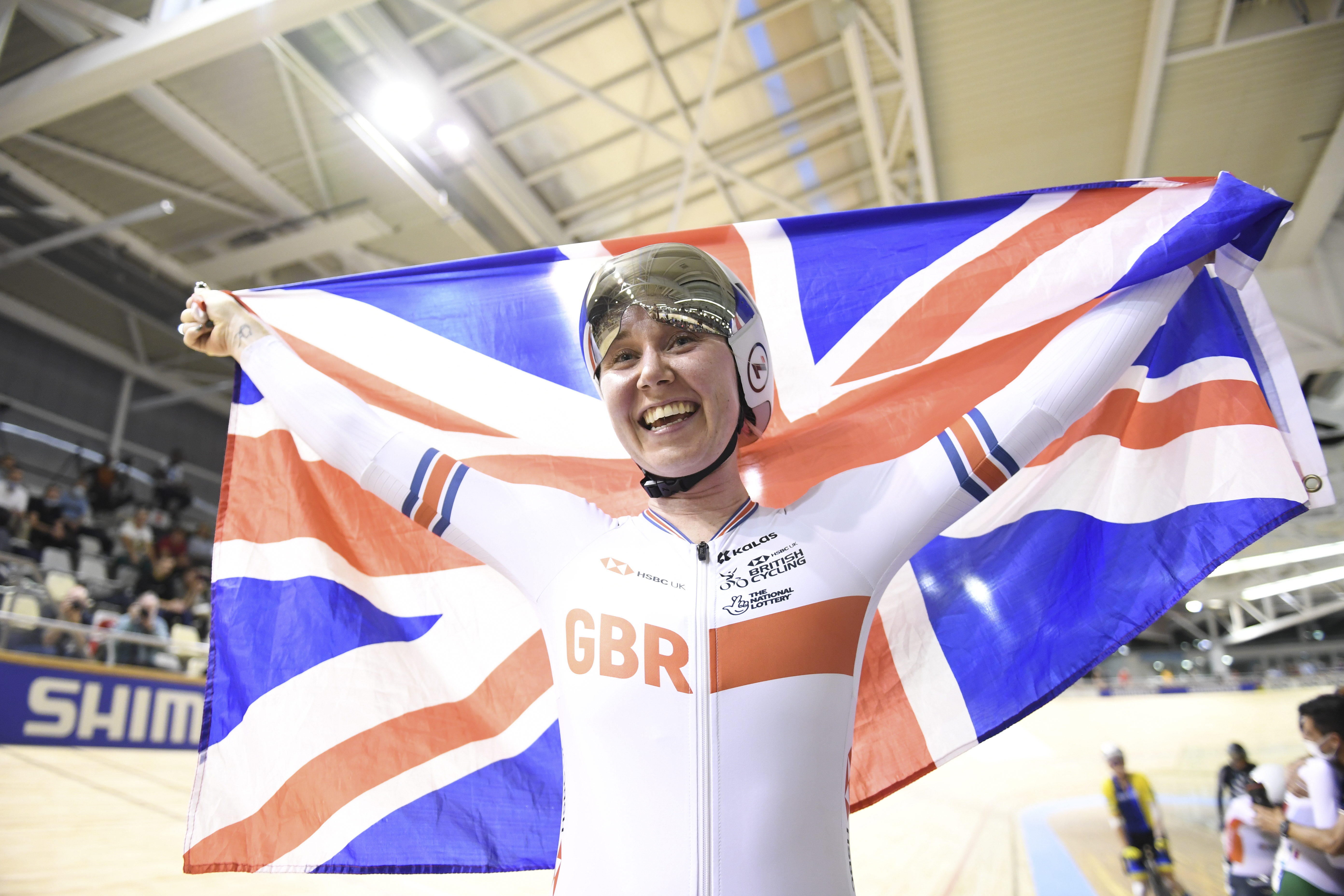 Katie Archibald with a GB flag
