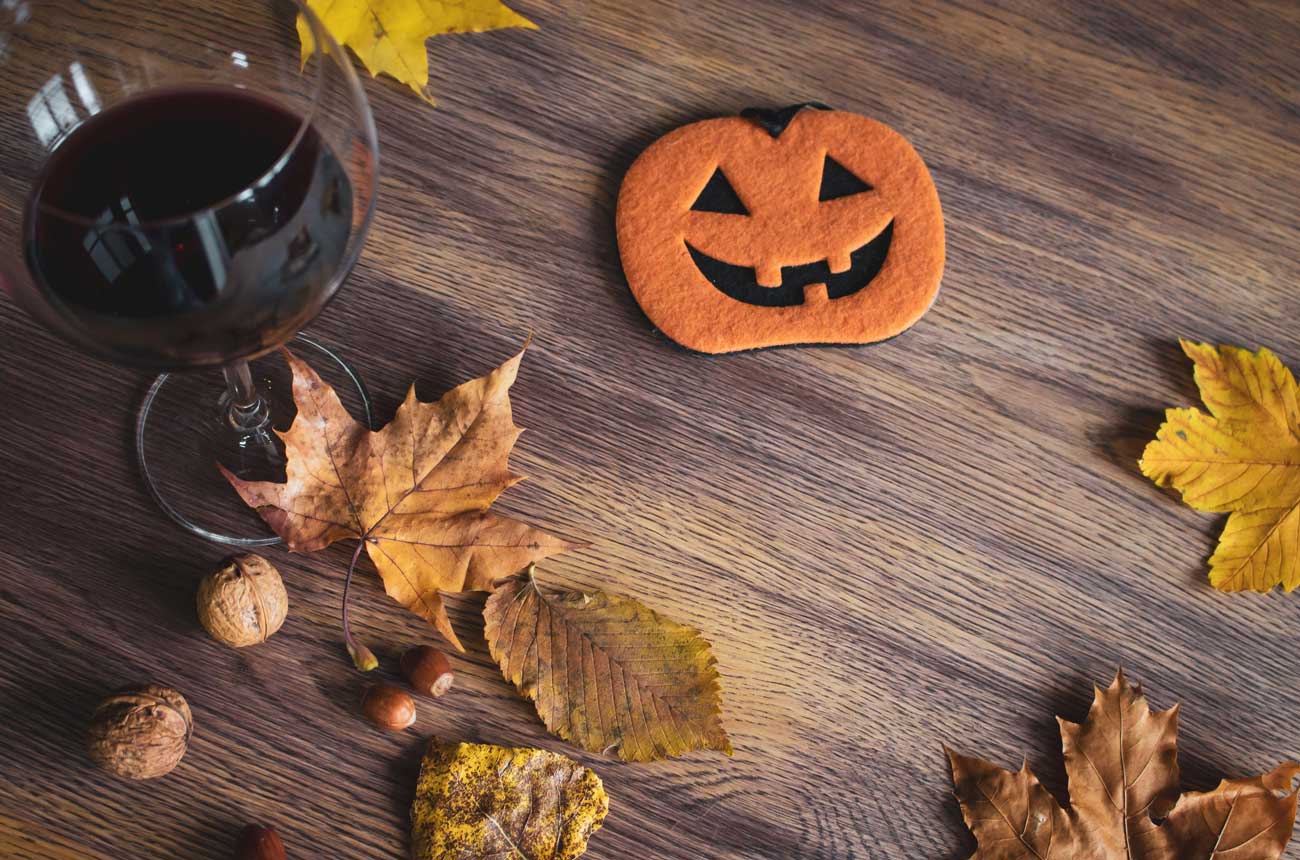 Halloween pumpkin and wine scene