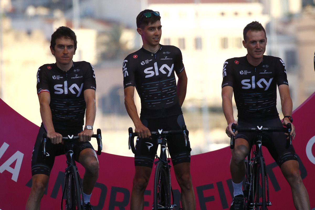 Team Sky's Geraint Thomas, Diego Rosa and Sal Puccio on stage