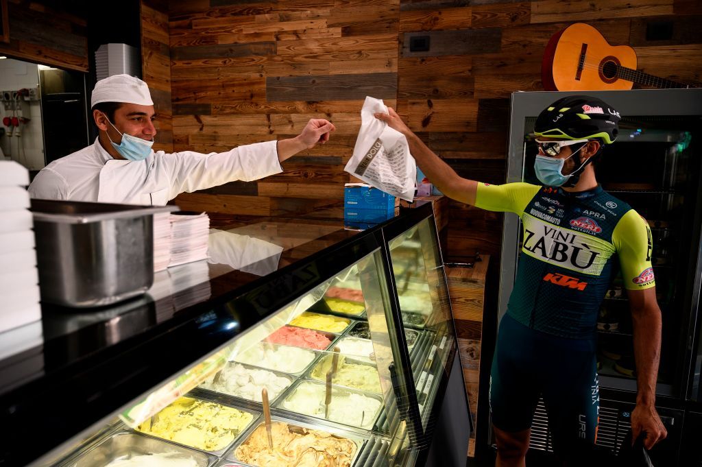 Umberto Marengo (Vini Zab&ugrave;-KTM) picks up some ice-cream for delivery