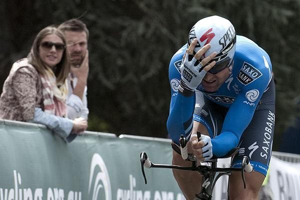 Keep ya hat on: Luke Roberts adjusts the helmet as he approaches the finish in Learmonth.