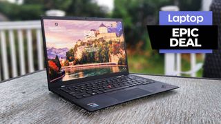 Lenovo ThinkPad X1 Carbon Gen 11 laptop on a wooden table outside 
