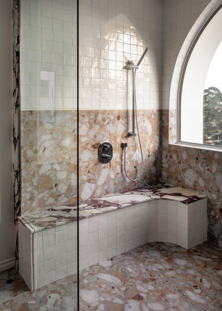 A neutral bathroom with clashing patterns