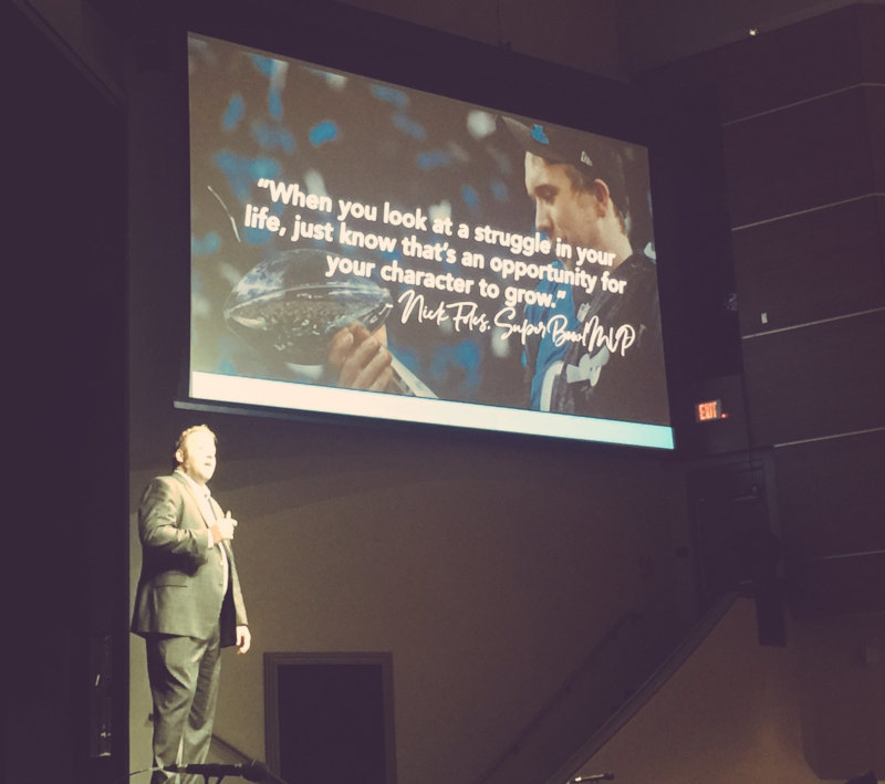 Tom Murray on stage during our 2018 PLC event