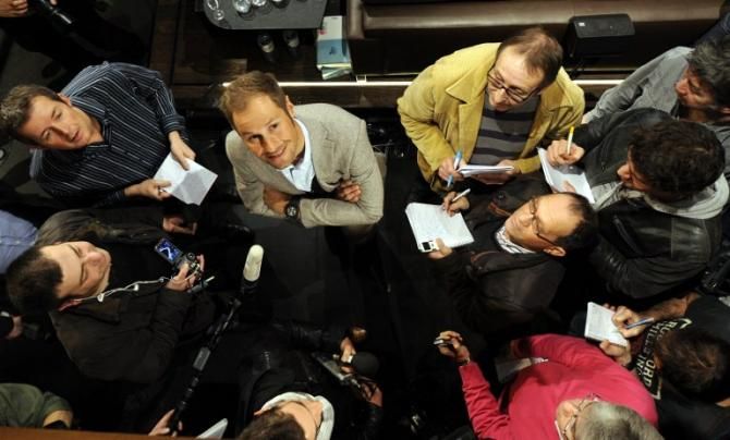Tom Boonen is surrounded by journalists during the presentation of the Omega Pharma-QuickStep cycling team