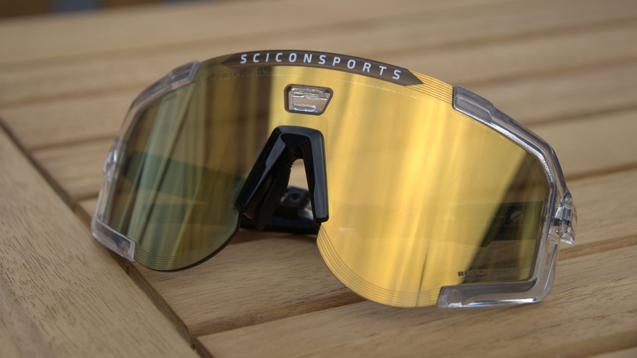 Scicon Aeroscope sunglasses on a wooden table