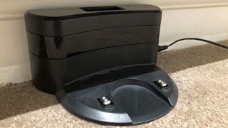 The Eufy RoboVac 11 will return to this charging dock. You'll need to setup in a location in your home.