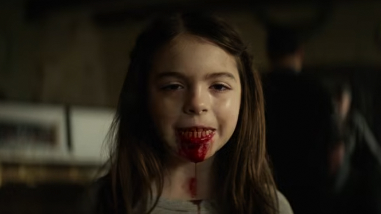 A girl with blood dripping out of her mouth in Lee Cronin's The Mummy