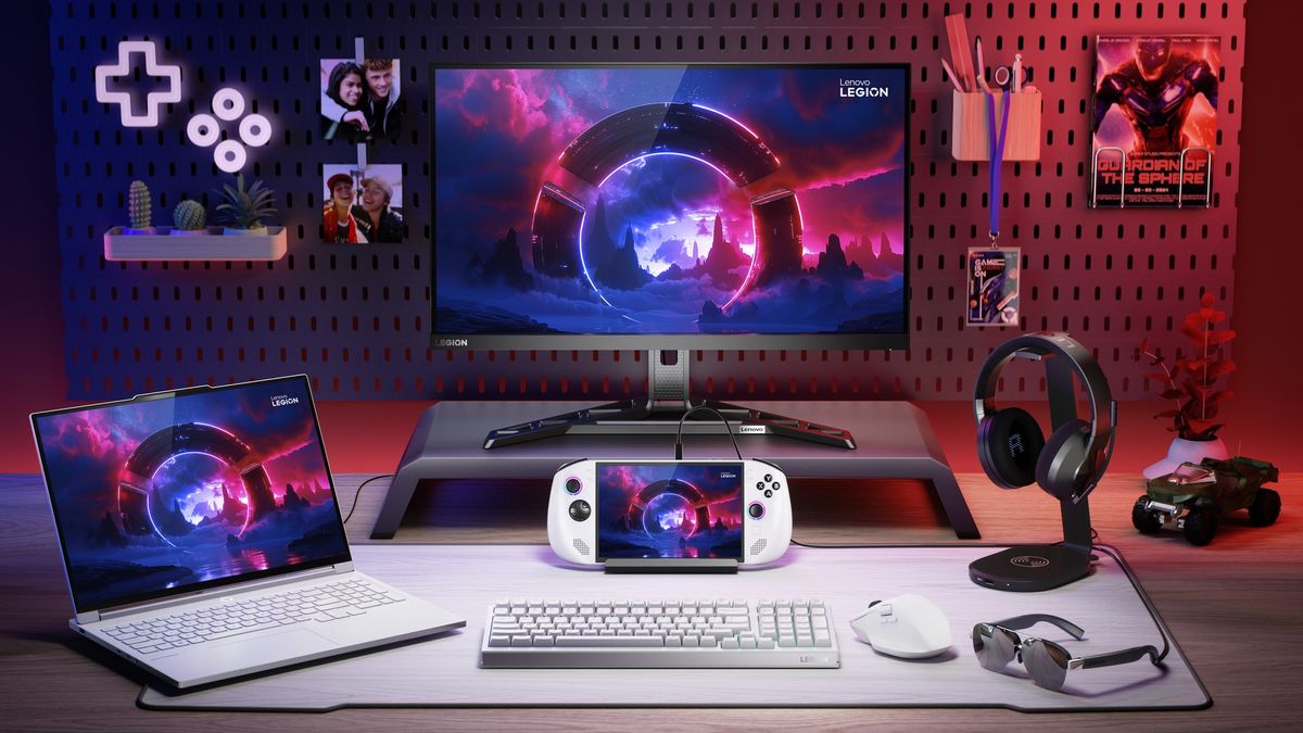 The Lenovo Legion Go S in a dock on a desk, surrounded by other Lenovo Legion hardware and accessories.