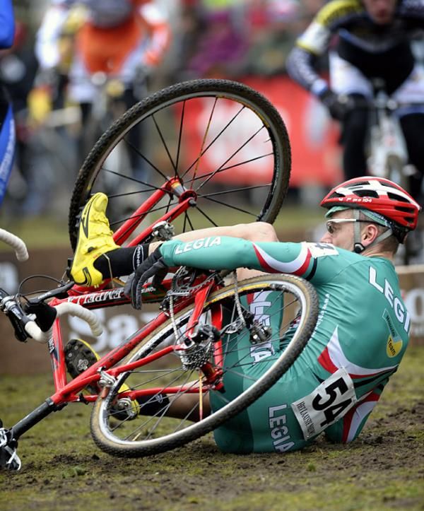 Marek Cichosz (Legia - Felt) untangles himself from a crash.