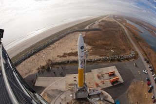 An Orbital Sciences Minotaur 1 rocket is seen atop Pad 0B at the Mid-Atlantic Regional Spaceport at NASA's Wallops Flight Facility on Wallops Island, Va., ahead of a Nov. 19, 2013 launch of 29 small satellites on the ORS-3 mission.