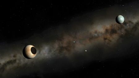 Artwork of the dwarf planet Pluto (left) and its largest moon Charon.