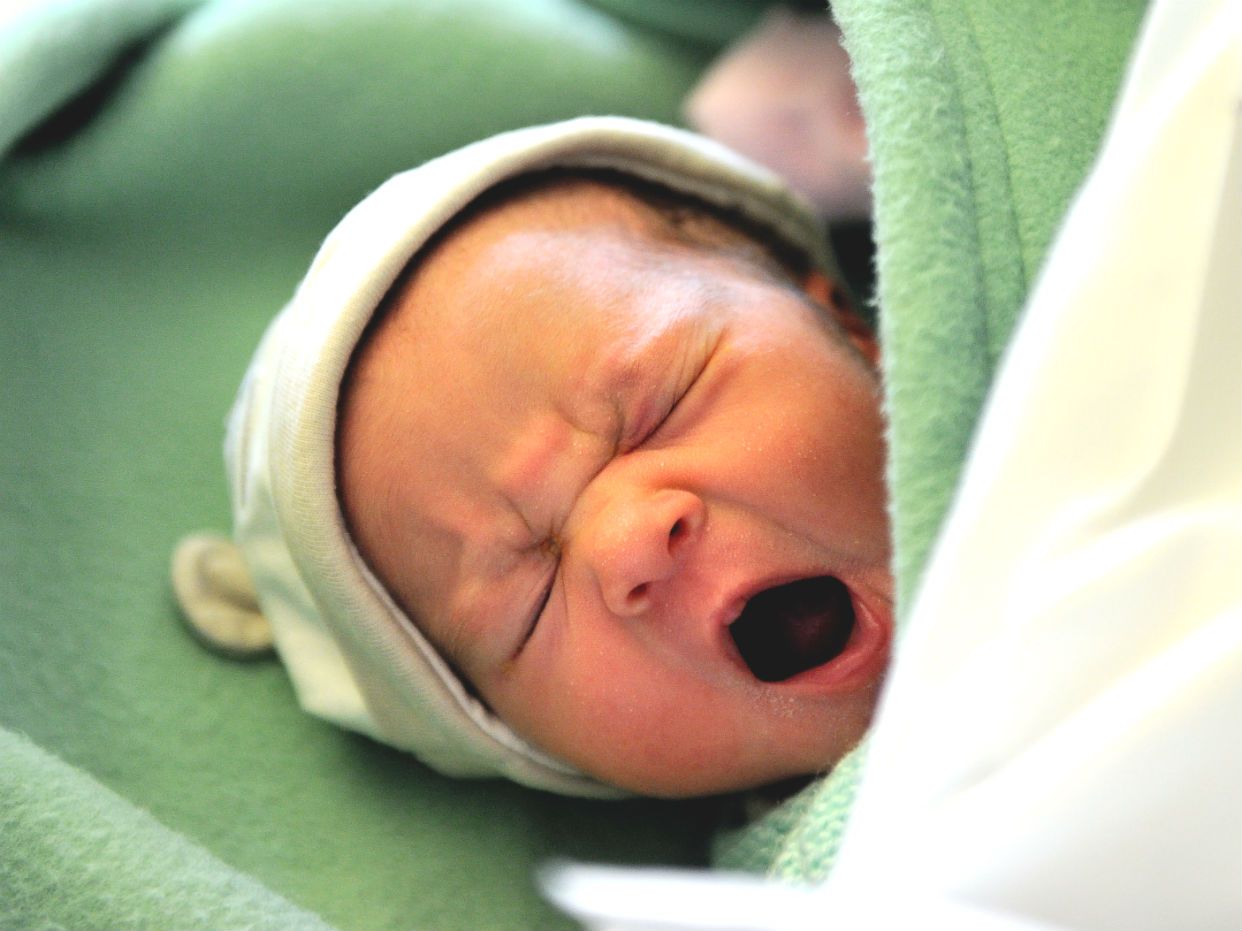 A baby yawning