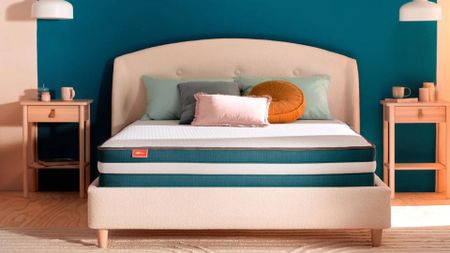 A Silentnight Just Sleep Range Silentnight Just Bliss mattress in a bedroom.
