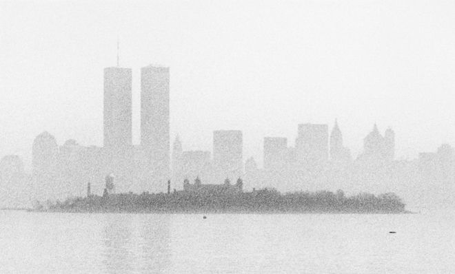 New York&amp;#039;s skyline as seen from the bridge to Ellis Island