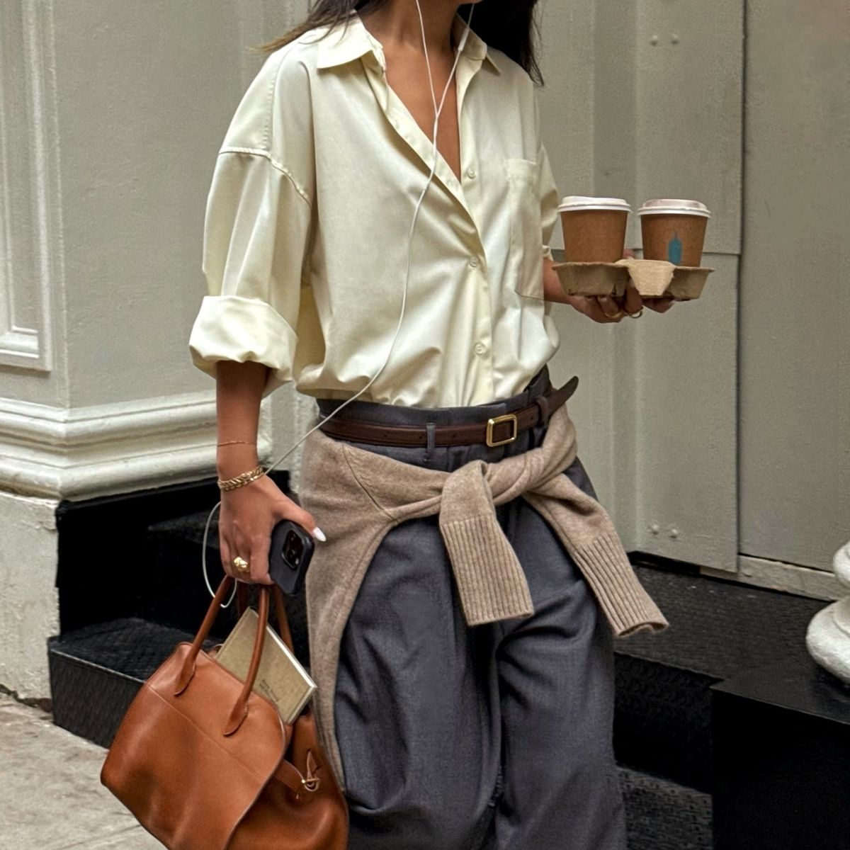 An image of @thecarolinelin wearing the soft layering trend, one of the biggest office outfit trends of 2026. 