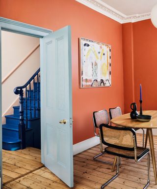orange room with bright blue door