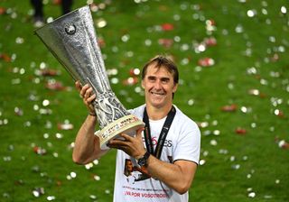 West Ham United target Julen Lopetegui, Head Coach of Sevilla celebrates with the UEFA Europa League Trophy following his team's victory in during the UEFA Europa League Final between Seville and FC Internazionale at RheinEnergieStadion on August 21, 2020 in Cologne, Germany.